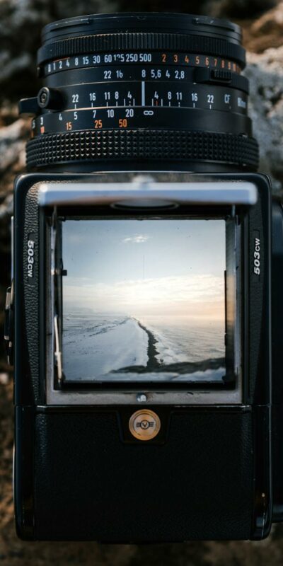 Camera with shot of snowy terrain on display