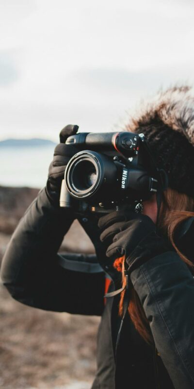 Photographer taking photo of landscape